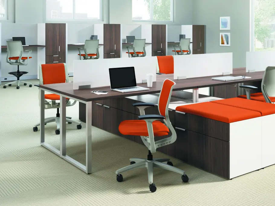 Workstations with storage pedestals and orange seat cushions